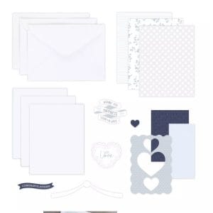 Contents of the Creative Memories Something Blue Card Kit with love- and wedding-themed sayings such as Congratulations, Wishing You Happiness, and With Love.